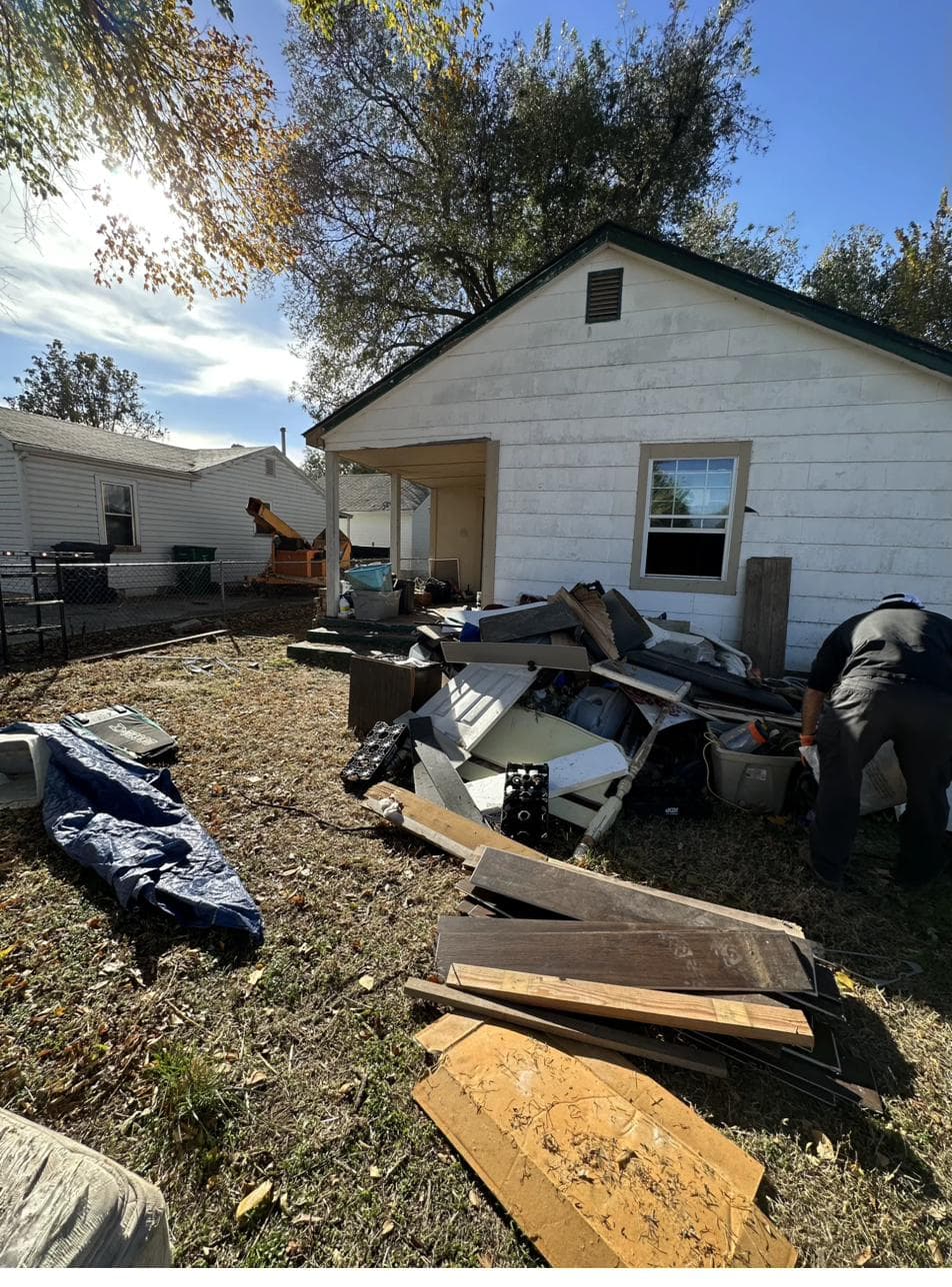 Before: Yard full of debris
